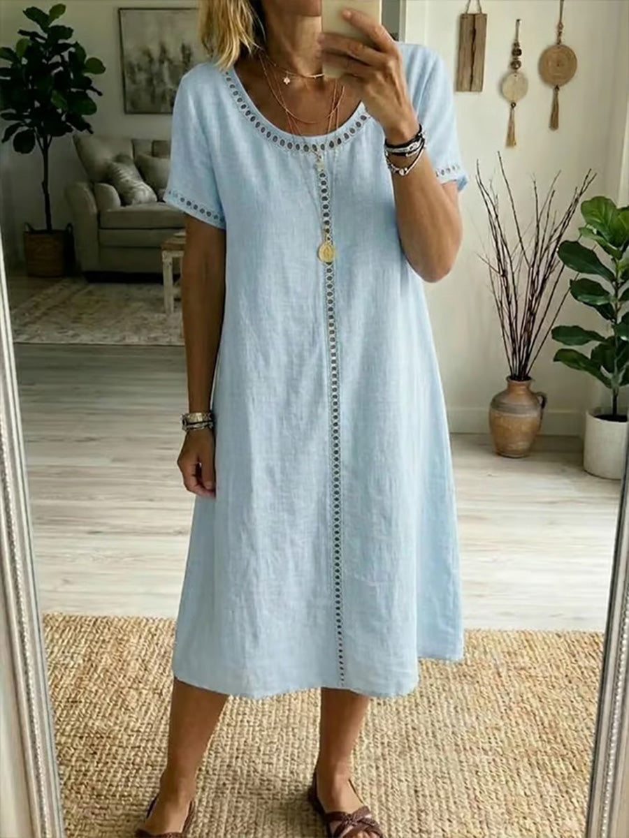 Einfaches einfarbiges Damenkleid aus Baumwolle und Leinen